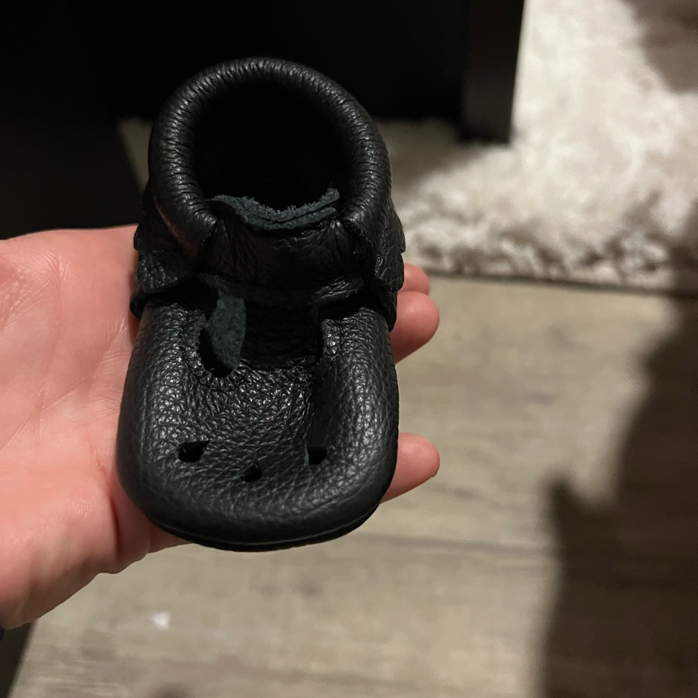 Black Leather baby shoes like new.
